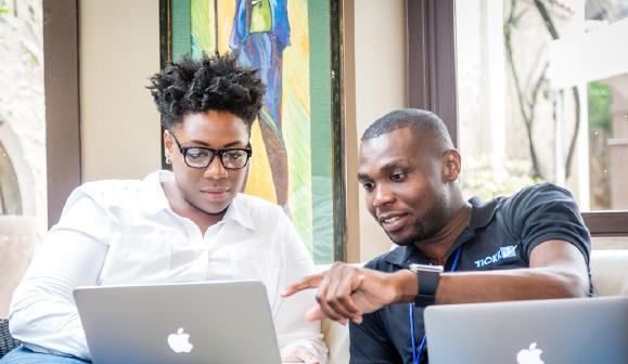 Photo: Kelly-Ann Bethel, SKED, Trinidad & Tobago (left) George Henry, Tikkiz Jamaica (right) ABOUT THE TRAINING PROGRAMME Using the Lean Startup Methodology a field-tested philosophy to creating and