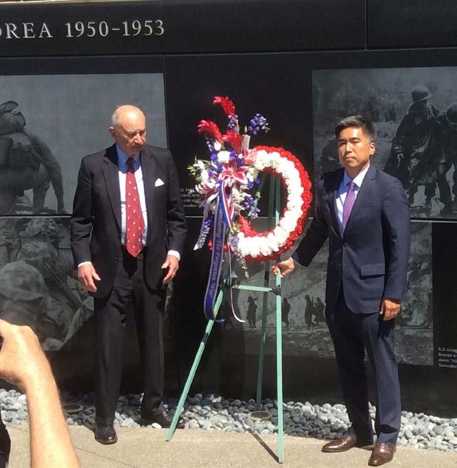 General Kim then placed the wreath in front of the