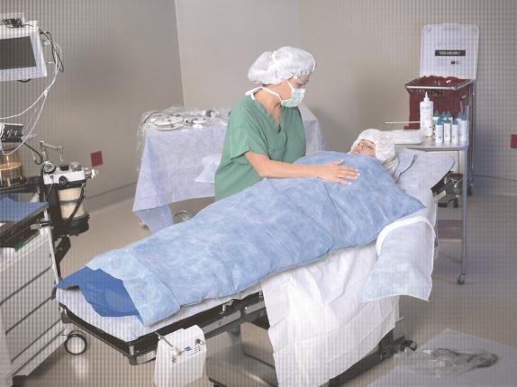 Device for the Surgical Setting Effectively maintain patient core temperature throughout the continuum of perioperative care Provide continuous warming during patient transport and room transfers