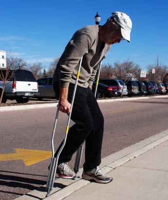 Follow with affected leg, placing crutches securely on curb or step.