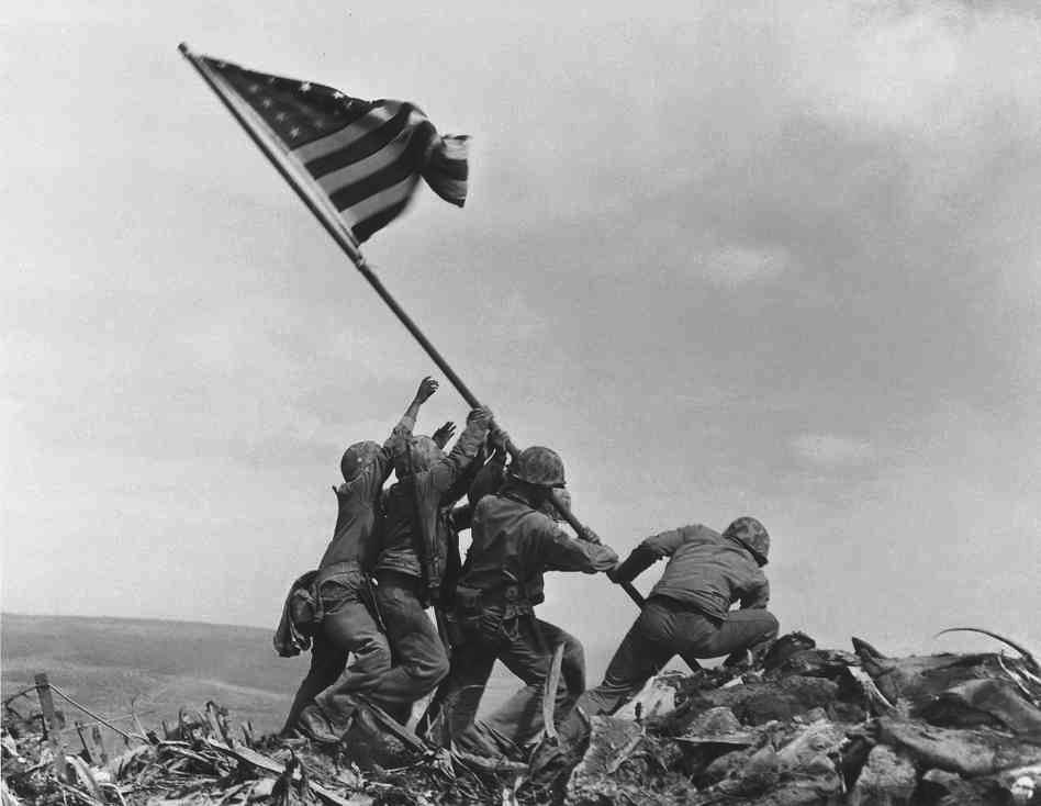 Iwo Jima critical as base from which planes can reach Japan 6,000 marines die taking island; of 20,700 Japanese, 200