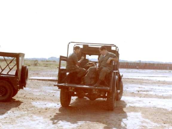 Soldiers and dog(s) in an M37 ¾-ton truck