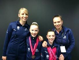3rd. Level 7 RG Australia Gold, Silver & Bronze Yaroslava Leonova gold ball & ribbon, silver hoop & clubs - overall