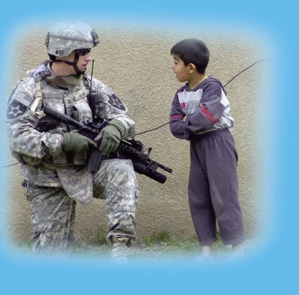 , takes the time to talk to a local Iraqi boy during the joint security effort coined operation Arrowhead Strike 9 in Baghdad s Ghazaliyah neighborhood March 23. By Spc.