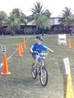 U.S. Army Kwajalein Atoll, Republic of the Marshall Islands (Photo by KW Hillis) Staying safely on course Gary Beal, 8, maneuvers through the bicycle confidence course during the Bicycle Rodeo and