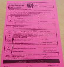 form is printed on bright pink paper and keep it visible