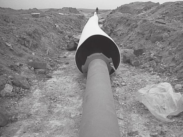 We then constructed a 3-foot-high berm on one side of the pipeline, which also failed to protect it.