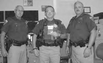 Pictured from left to right are Ryan Krueger, Trooper Brad Moore, Founder of Mystery Ranch Dana Gleason, and Sergeant Marvin Reddick. Angeles, Washington.