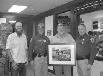 In August of 2013, District III Commander Captain Gary Becker presented Sergeant Mark Wilfore with his ten year service stars and Sergeant Jay Nelson with his fifteen year service stars.