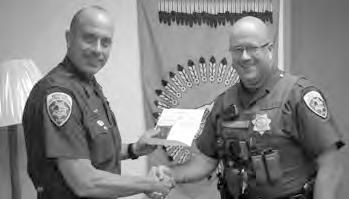 presented Trooper Todd Hagenbuch (MHP 163) with his five year star and letter