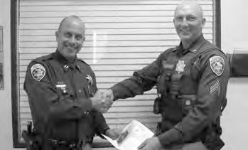District IV Commander Captain Keith Edgell presented Trooper Brian Sampson
