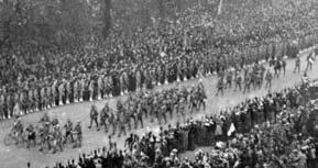 The Volunteers were welcomed back to London by a great crowd, which accompanied them on their march through the Capital, ending with a banquet in the Guildhall.