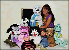 School. Performing will be ventriloquist, Vikki Grasko Green, shown in the picture on the right with many of her friends.
