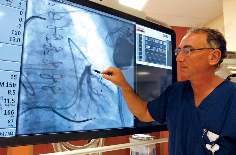 Sponsored Section Cardiac Care Provided by Johnston Health Eric Janis, a cardiologist affiliated with UNC Health Care, demonstrates a device implanted in patients that allows physicians to watch for