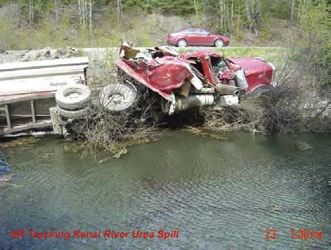 A tractor trailer hauling approximately 50,000 lbs of urea fertilizer from Nikiski to Anchorage overturned losing its entire cargo into a slough adjoining the Kenai River.