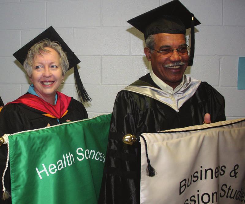 Weinkauf likes the fact that Luna CC can give students personal attention Annette Weinkauf recently carried the Health Sciences flag for graduation. She is pictured here with Harry Anderson.
