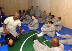 instructors during a weeklong train the trainer session, Aug. 17 24. The combatives program, which is centrally located at Ft. Benning, Ga.