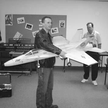 Rich Tiller Showed his F-18 Hornet Nick Brown Showed a turbine to be used in the F-18. RAFFLE This month s raffle included ten items of building supplies.
