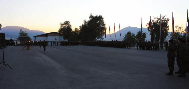 DAY OF GERMAN UNITY AT CAMP PRIZREN An atmospheric evening: the German KFOR contingent s ceremony on the Day of German Unity (Source: Bundeswehr/PAO DEU EinsKtgt KFOR) The German