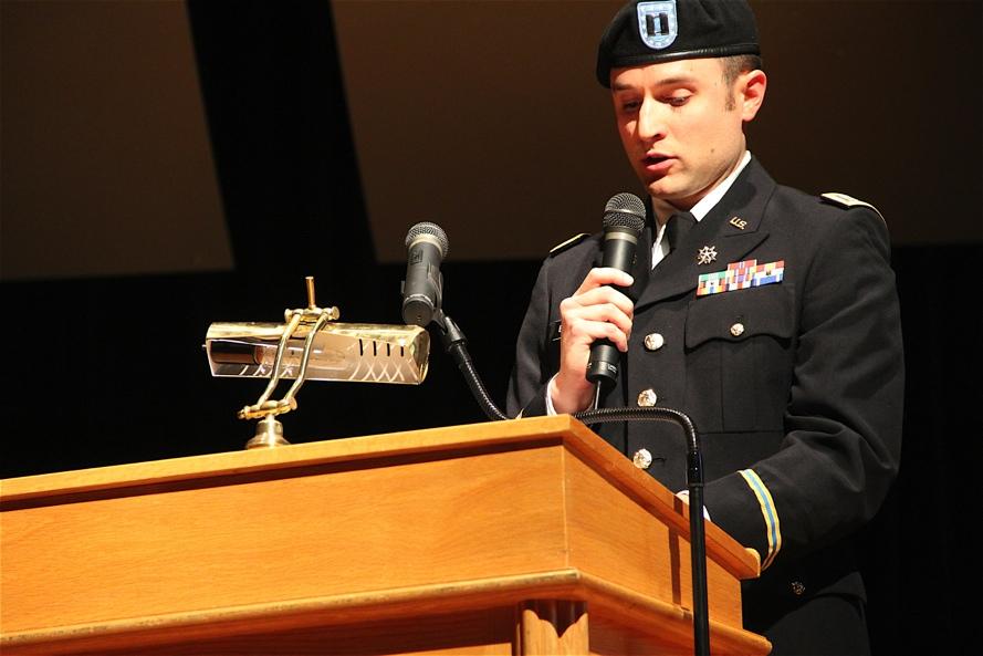 U.S. Army Captain Seth Burgess, a 2002 NHS graduate, led the audience at the concert in the Pledge of Allegiance and read patriotic quotations before each musical selection.