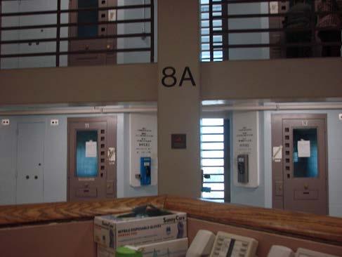 Each is accessed from a secured inmate elevator lobby, passing the floor security station and down a corridor to the respective pod entrance door.