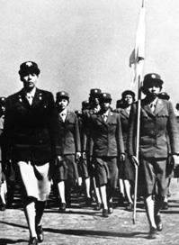African-American WACs march, with Charity Adams leading. Adams was the first African-American WAC commissioned officer. cated to keeping stories past and present alive.