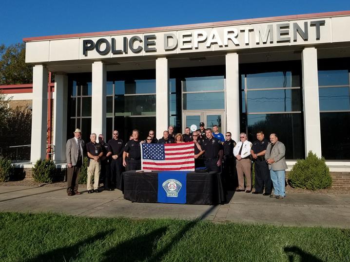 Ground Zero Flag Remembering the 9/11 Tragedy Nov. 3 - An American Flag flown days after the 9/11 tragedy at Ground Zero was raised Friday morning in front of the Prince George Police Department.