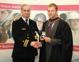 Viv Gough presents student Coin Harrington the Bernard Toft Compass Award.