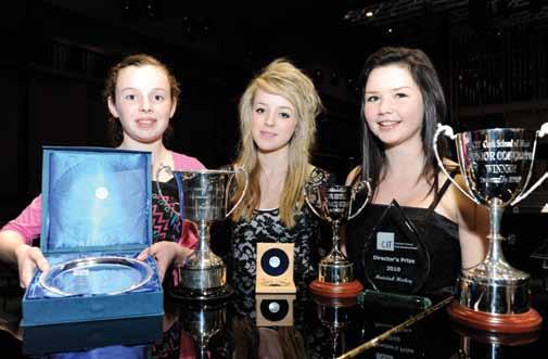 Curtis Perpetua Trophy; and the Pro Musica Trophy. Grace Coughan, Caoifhionn Ní Choieain and Mairéad Hickey with their prizes.