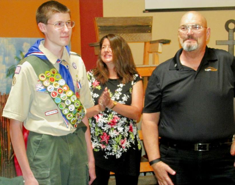 Top: Newly-promoted Eagle Scout John W. LeGalley celebrates with his mother, Capt. Teresa M. LeGalley of Albuquerque Heights Spirit Composite Squadron and his father, Mr. Rex LeGalley. (Photo: Lt.