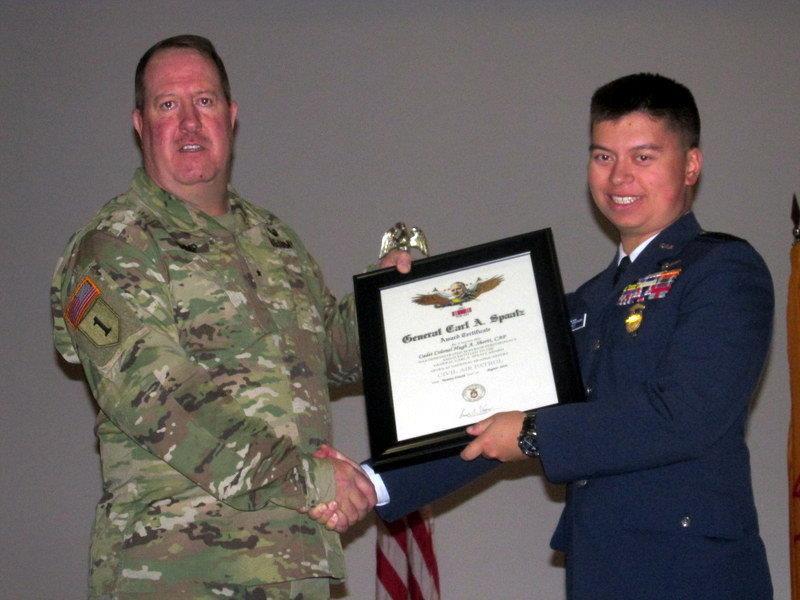 Top: (L-R) Brig. Gen. Thomas P. Bump, Land Component Commander of the New Mexico National Guard, presents the Gen. Carl A. Spaatz Award to Cadet Col. Hugh A. Shortt. (Photos: Lt. Col. Jay T.