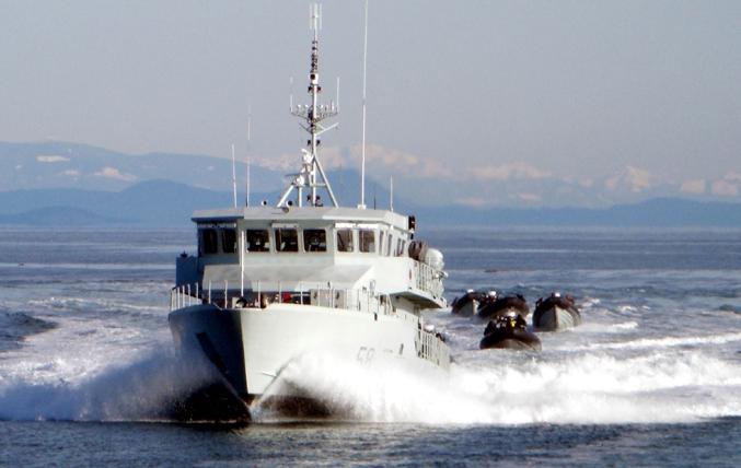 Freeze frame Photo: RCMP Orca-class training vessel Renard, followed by RCMP rigid hull inflatable boats, conducts maritime boarding exercises near Victoria in late January.