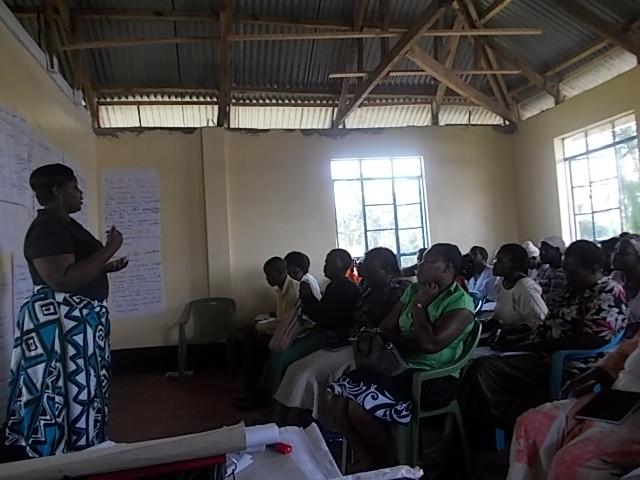 One of the CHEWs (Community Health Extension Worker) of the City Health Department facilitating the CHW training Page MCI Public Health Specialist at Manyatta B CHW training 5