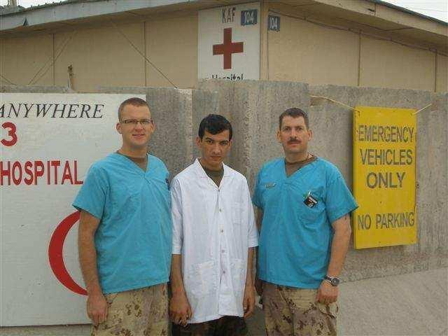 Capt Kerr Williamson, Lt Abdul Malik, who is an ANA dentist from KRMH visiting the Role 3 dental clinic, and WO Todd Sinclair.
