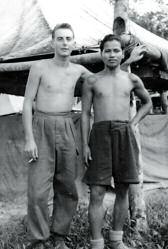 Andy Nicoll and Andil anak Unting (Iban tracker), B Company, 1 KOSB, at Niyor Rubber estate, near Kluang, mid/late 1950's.
