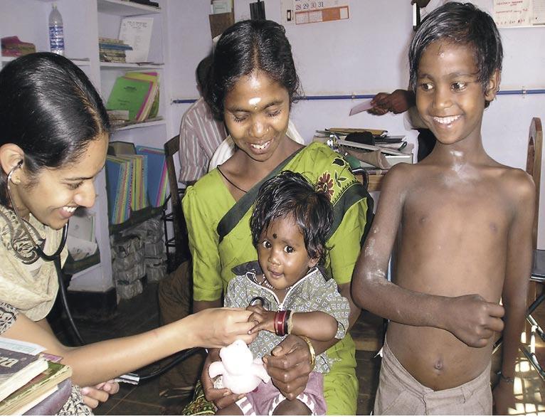 Institutional grants : Health S I R R A T A N T A T A T R U S T A N N U A L R E P O R T 2 0 0 6-2 0 0 7 A family hailing from the Adivasi population of Gudalur Valley, Tamil Nadu, receive medical