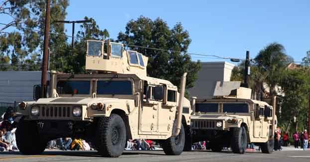 Military policemen with Military Police Company, Combat Logistics Regiment 17, 1st Marine Logistics Group, provided two Humvees