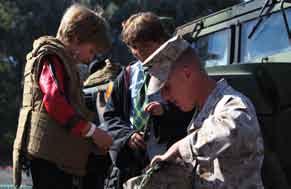 A young girl starts up a Humvee at the 2011 Mission Bay Montessori Academy Halloween Carnival, San Diego, Oct. 28.