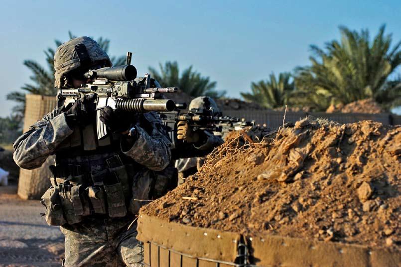 check point in Arab Husan, Iraq, during Operation Lewis and Clark Nov. 5. Photos by Pfc.