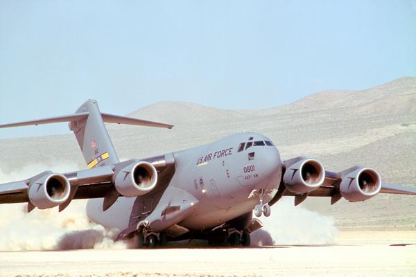 Figure 10. C-17 Landing on an Unimproved Runway (from The Boeing Company, n.d.) As the aid stockpiles grew, it became apparent that it was difficult to distribute the aid efficiently without large-scale vehicle assets.