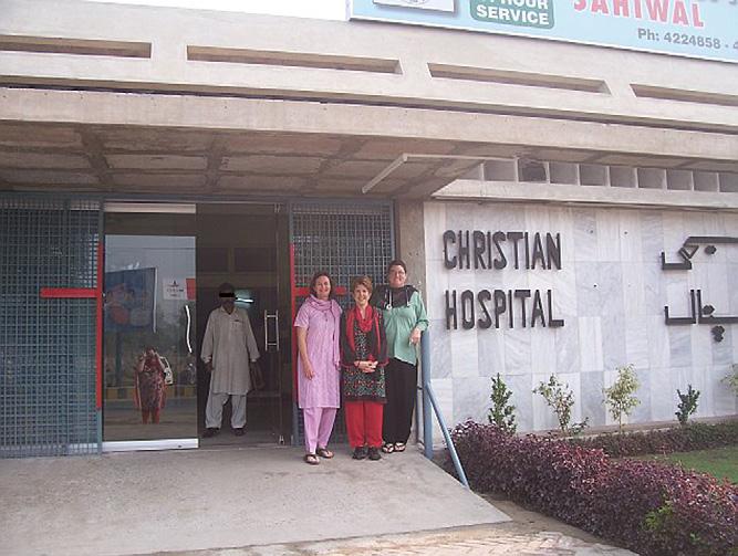 FIGURE 1 Left to right: Doris Egli, Alicia Bowman, and Brenda Gately at the entrance to Christian Hospital in Sahiwal, Pakistan. 2 prior medical mission trips to Cambodia and Kenya.