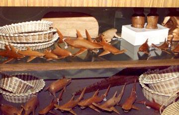 Some of the big sellers are carved sharks from Pohnpei that include real sharks teeth.