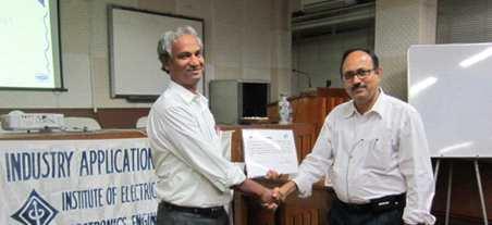 Dr. M. Sengupta, Chairman IEEE-IAS Kolkata Chapter, handing over the certificate of appreciation to Mr.