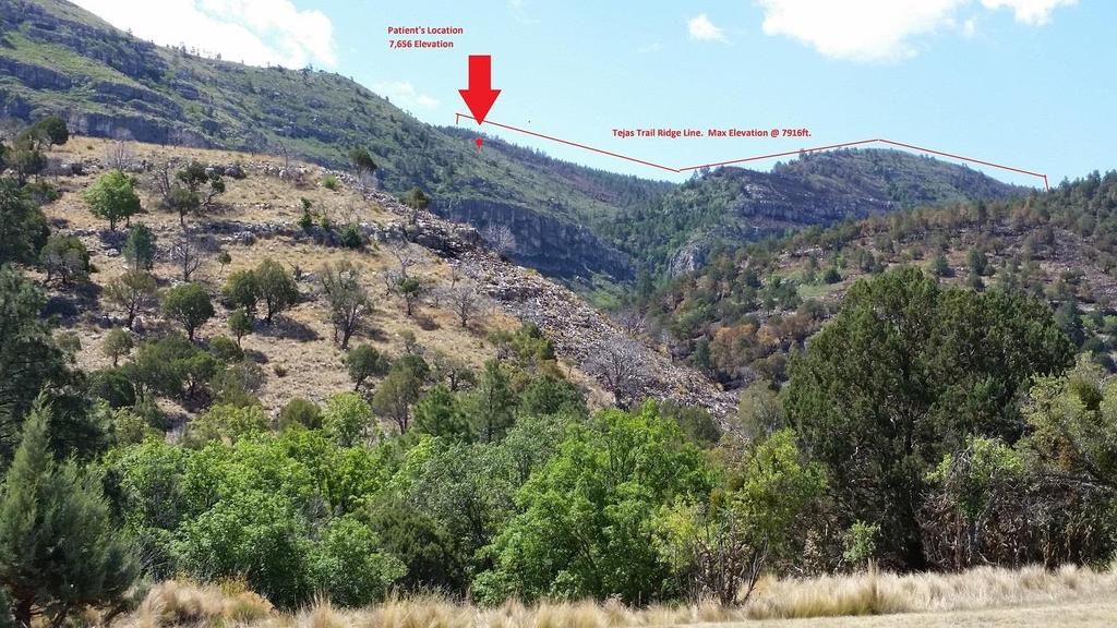 The trail follows this ridgeline, whose maximum elevation is 7,916 feet. Photo shows the patient s location.