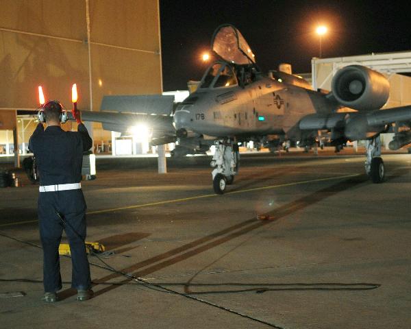6 of 18 8/16/2010 1:21 PM Airman 1st Class Jeff Gronemyer, an A-10C Thunderbolt II crew chief from the 355th Aircraft Maintenance Squadron at Davis-Monthan Air Force Base, Ariz., directs 1st Lt.