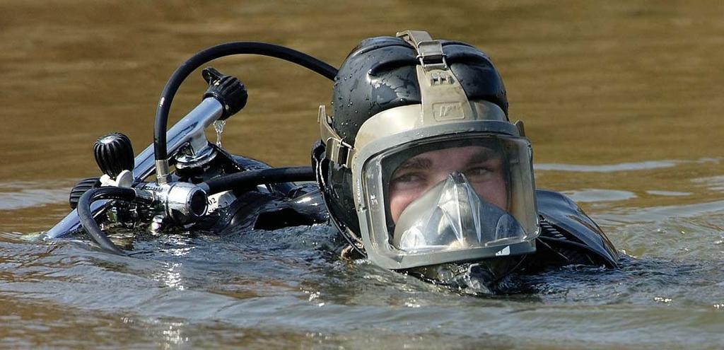 A Canadian combat diver at work during Operation Unison. Canadian divers had life-support systems that enabled them to work in polluted waters.