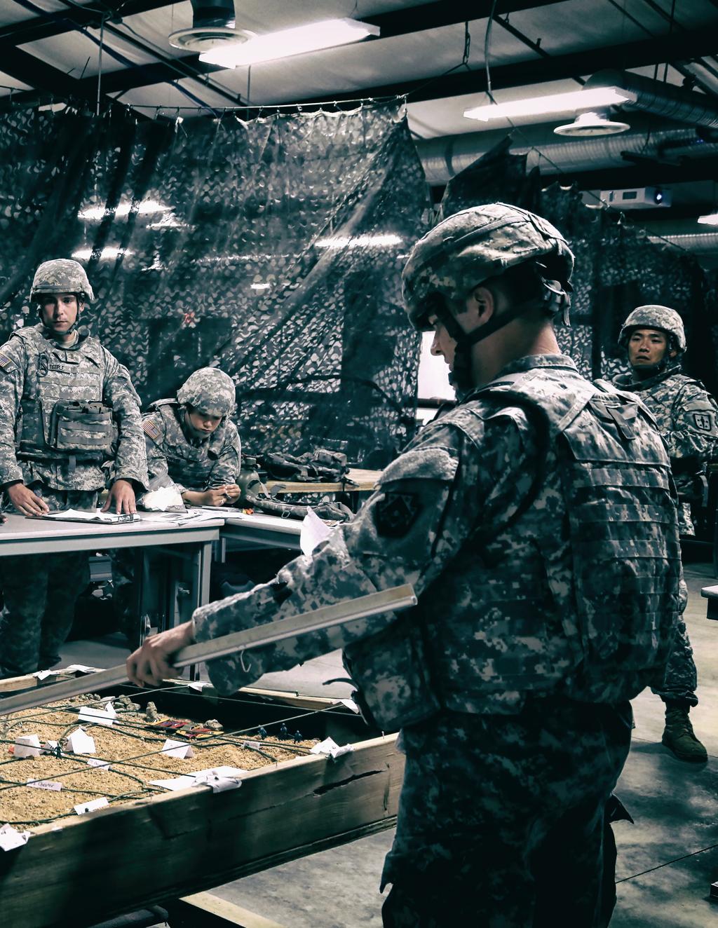 Basic Officer Leader Course students conduct an operation order brief for a training mission in order to synchronize all