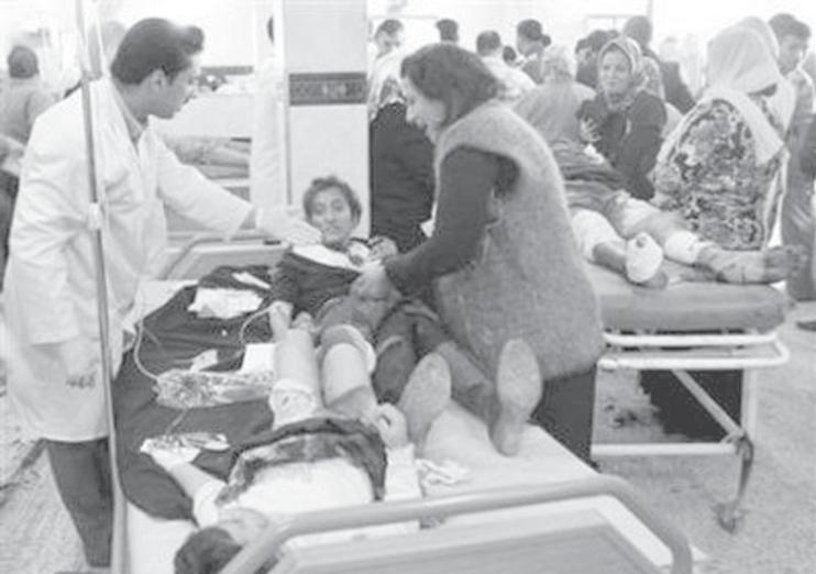 Bomb attack victims receive treatment in a hospital in Kirkuk, 250 km (155 miles) north of Baghdad on 11 December, 2008.