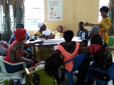 Image 12: Health worker facilitating review session learning activity with TTMs, TBAs, male local leaders and pregnant women While it is not possible to generalize the specific results to other