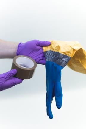 Additional taping vs no taping Taped connections gloves/boots with coverall enable "one stroke" doffing; No taping saves time in donning; Avoids pitfalls from improper execution (PPE damage,